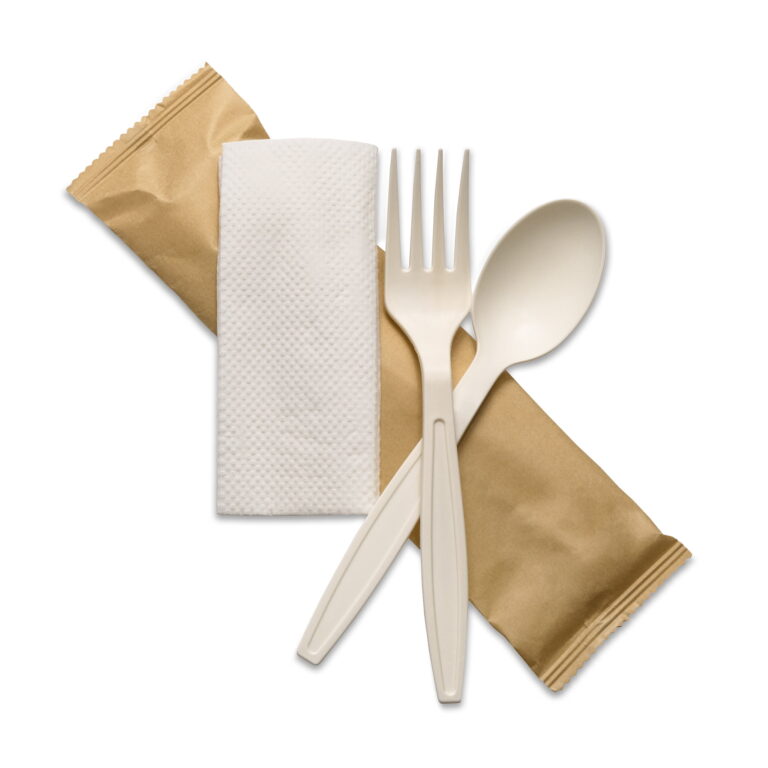 Cornstarch cutlery kit with a fork, spoon, napkin and sealed pouch