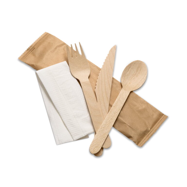 Birchwood cutlery kit with knife, fork, dessert spoon and recycled paper napkin in a kraft paper sleeve