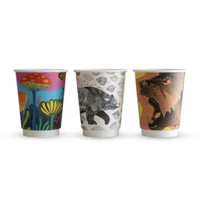 Three assorted double-wall takeaway cups with colourful mushroom, monochrome animal and orange animal designs.