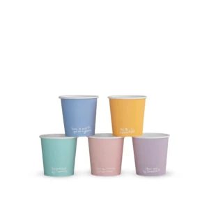 Five pastel-coloured Feel Good takeaway hot cups arranged in a group on a white background