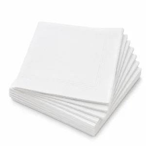 Stack of white Tablin cocktail napkins with a subtle embossed border