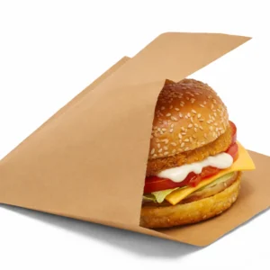 Burger held in an open-sided kraft paper takeaway bag