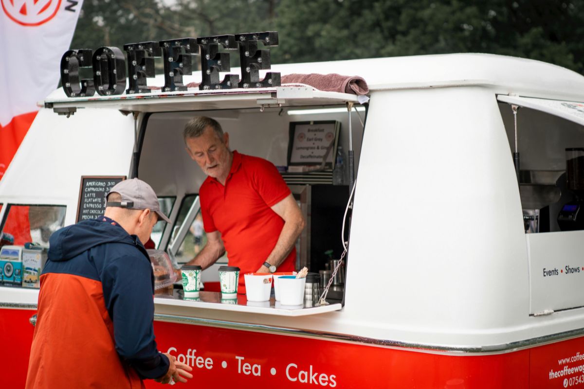 Coffee street vendor using recyclable cups