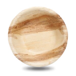 Empty 7-inch round palm leaf bowl on a white background