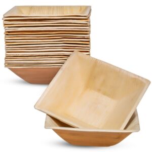 Stack of square 7-inch palm leaf bowls with two bowls in front